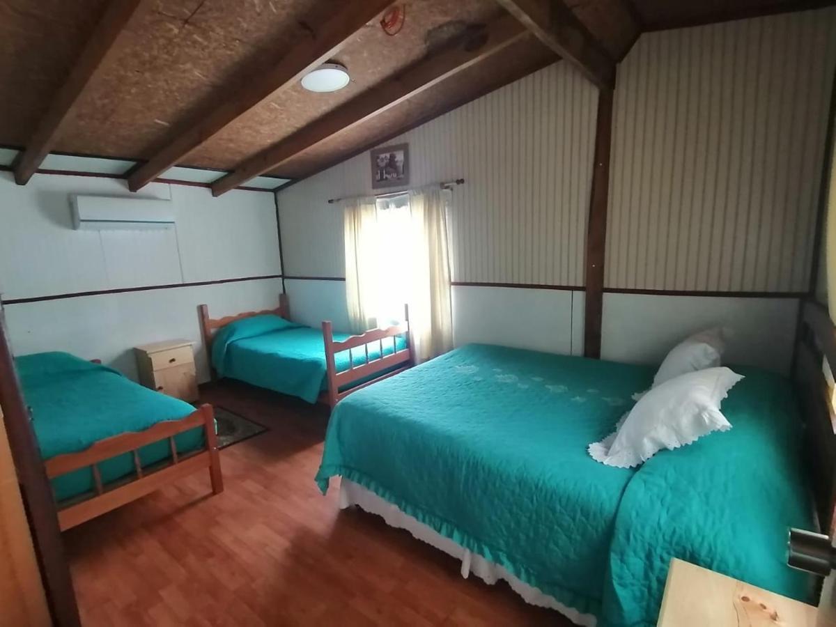 Hostal Y Cabanas Ventisquero ปูแอร์โต ปูยูวาปี ภายนอก รูปภาพ